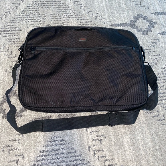 Tumi Nylon Laptop Bag Celina Backpack BLACK/GOLD Original TUMI Indonesia Tumi Nylon Laptop Bag Celina Backpack BLACK/GOLD Original TUMI Indonesia